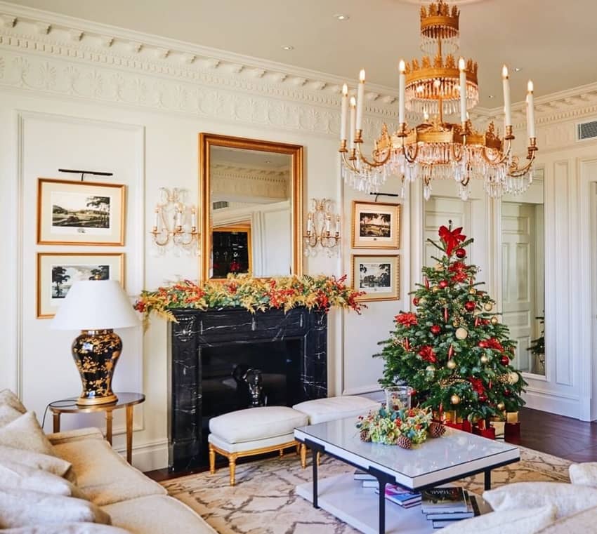 living room christmas tree next to fireplace