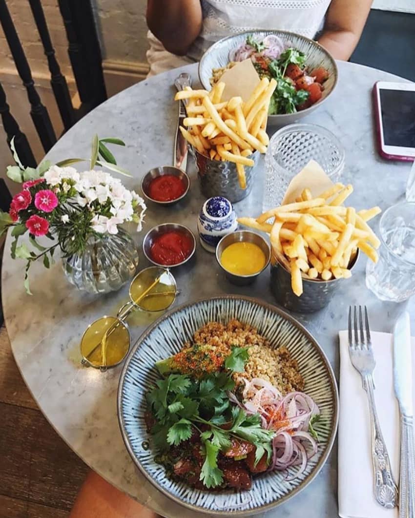 nac mayfair table with fries and quinoa salad