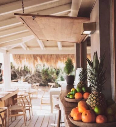 El Chiringuito Ibiza fruit platter on wooden counter