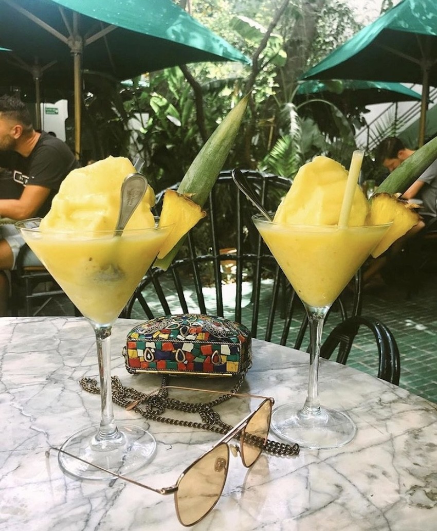 Le Jardin Marrakech yellow cocktails sunglass