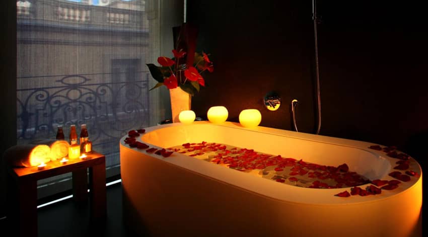 Ohla Barcelona lighted bathtub rose petals