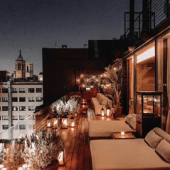 The Edition Barcelona rooftop terrace with beds and lights