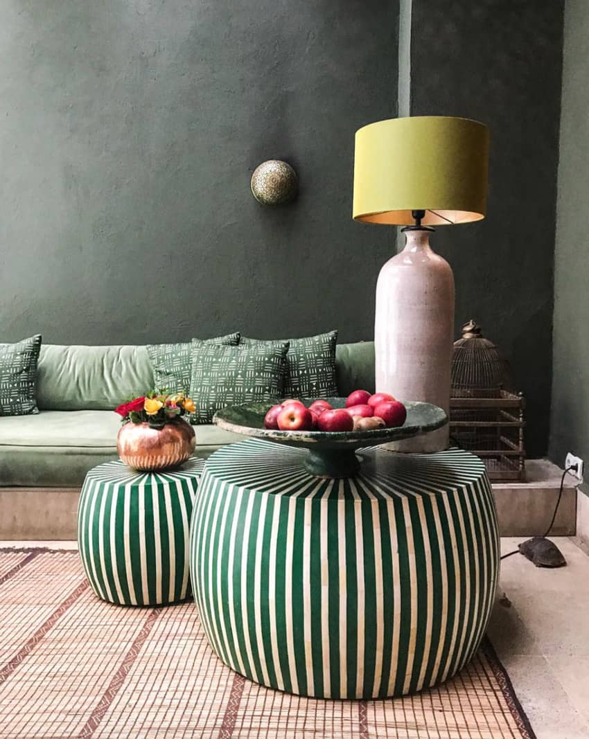 green striped bulky table green couch tall lamp