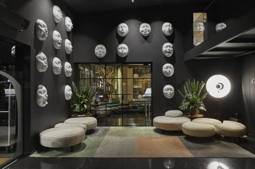 hotel lobby ceramic faces contemporary artwork