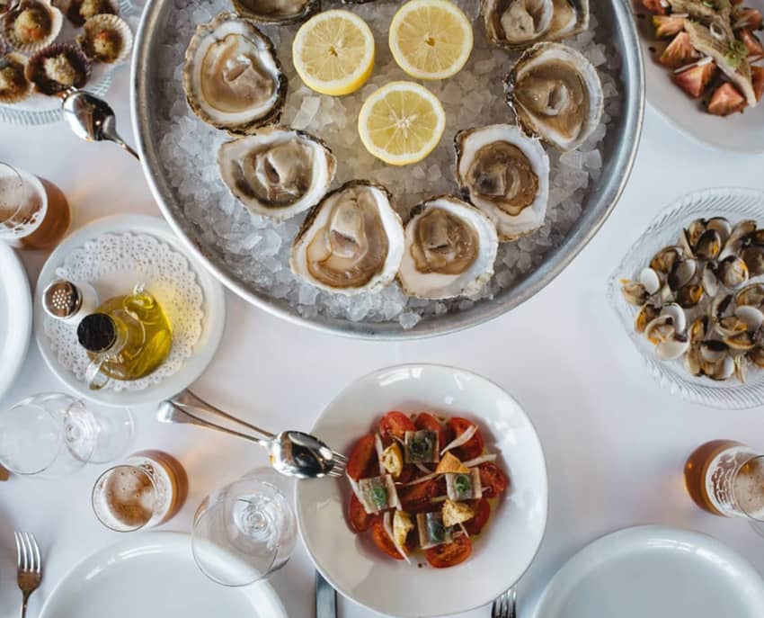 table feast oysters clams baked scallops