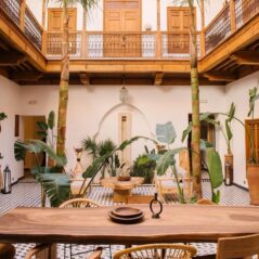 large moroccan wooden table balcony view