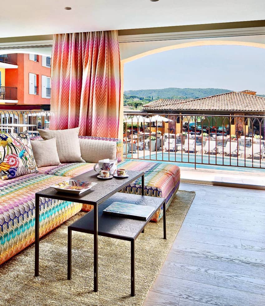 Hotel Byblos colorful couches pool view