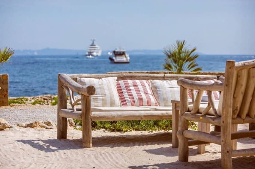 wooden furnitures on the beach sea view