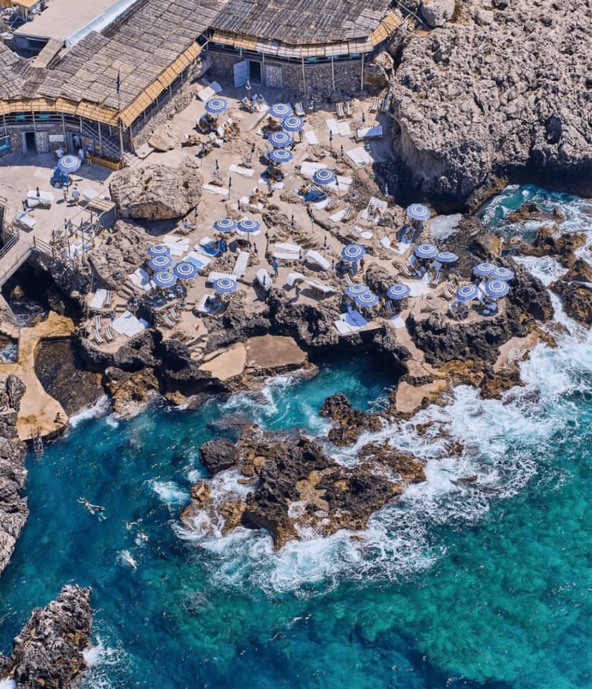 La Fontelina Capri beach club faraglioni rocks