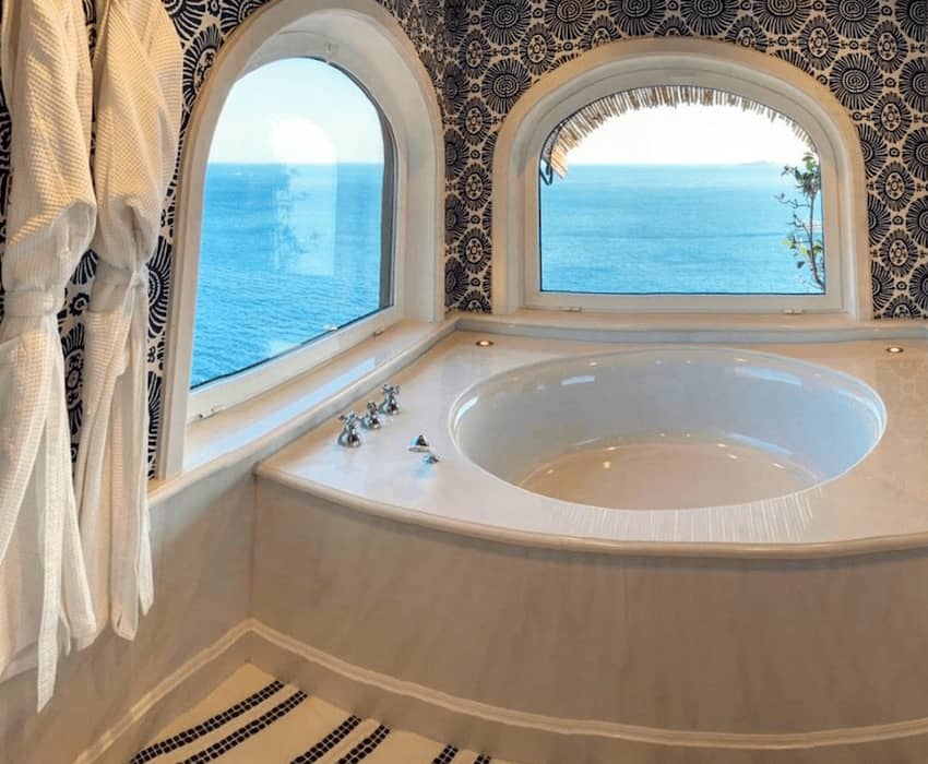 italian tiles bath tub window sea view