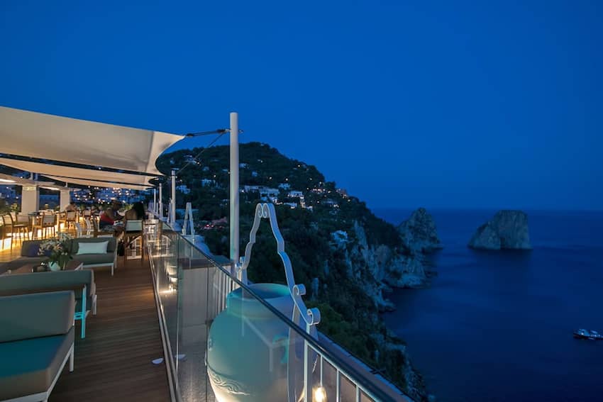 lounge bar nightscene balcony sea view cliffside