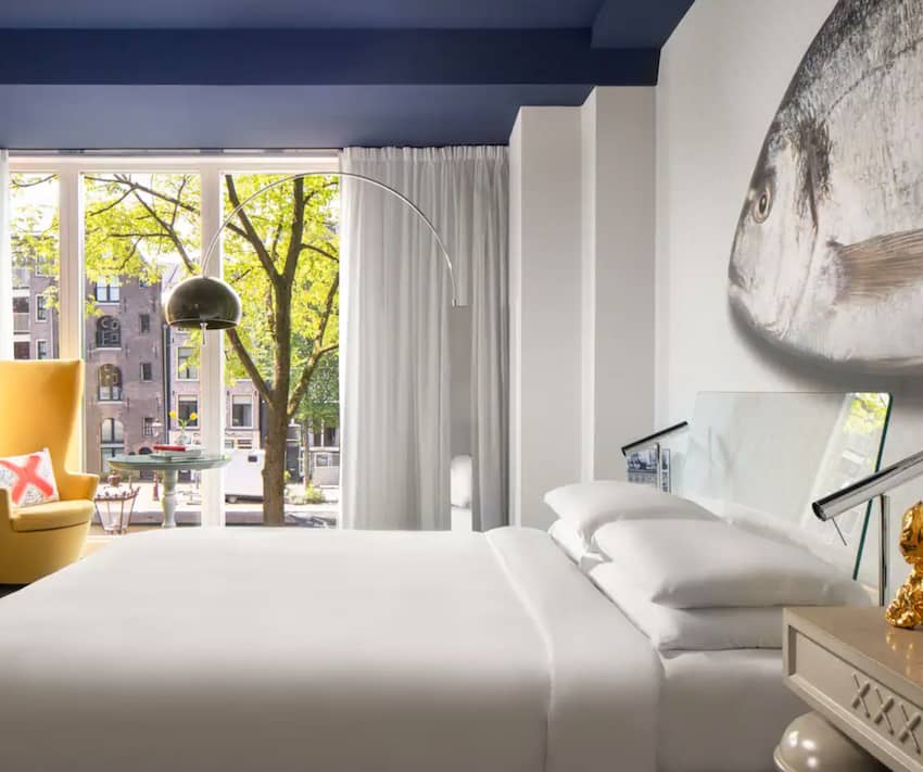 Andaz Amsterdam queen bed canal view 