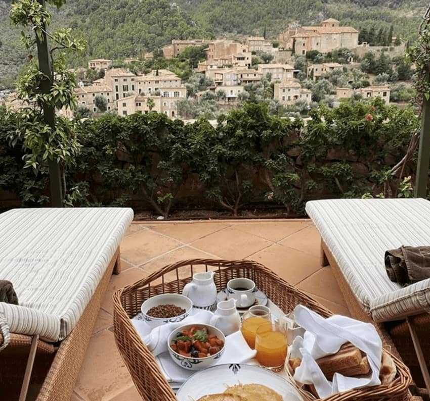 delicious breakfast overlooking deia's picturesque houses