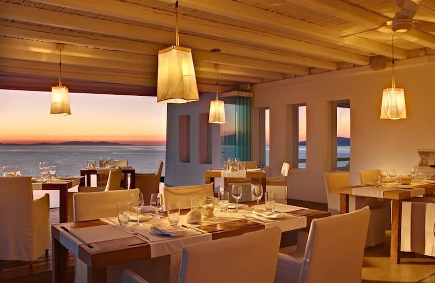 dining sea view hanging lamps lit