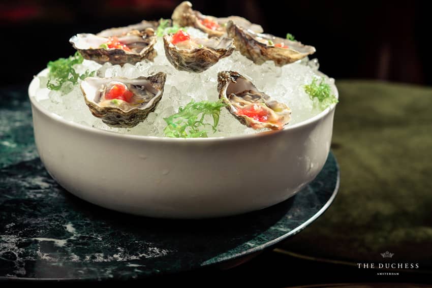 fresh oysters with tomato consomme