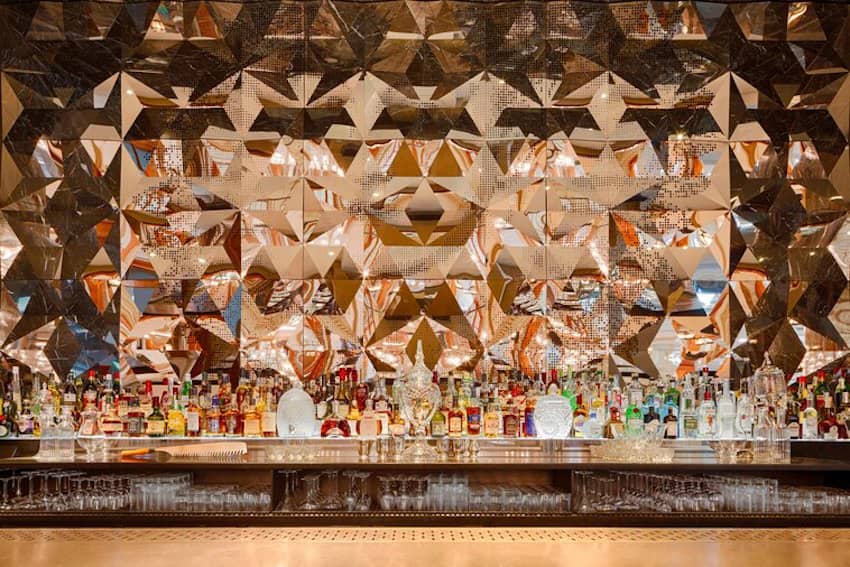 geometric shaped mirror cocktail bar