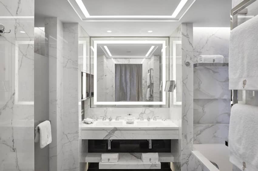 grey marble tiled bathroom double basin lighted mirror