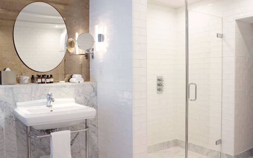 tiled bathroom walk in shower round mirrors
