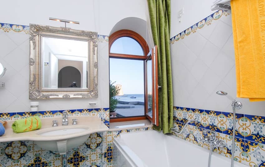 La Canzone Del Mare Capri bathtub sink overlooking window