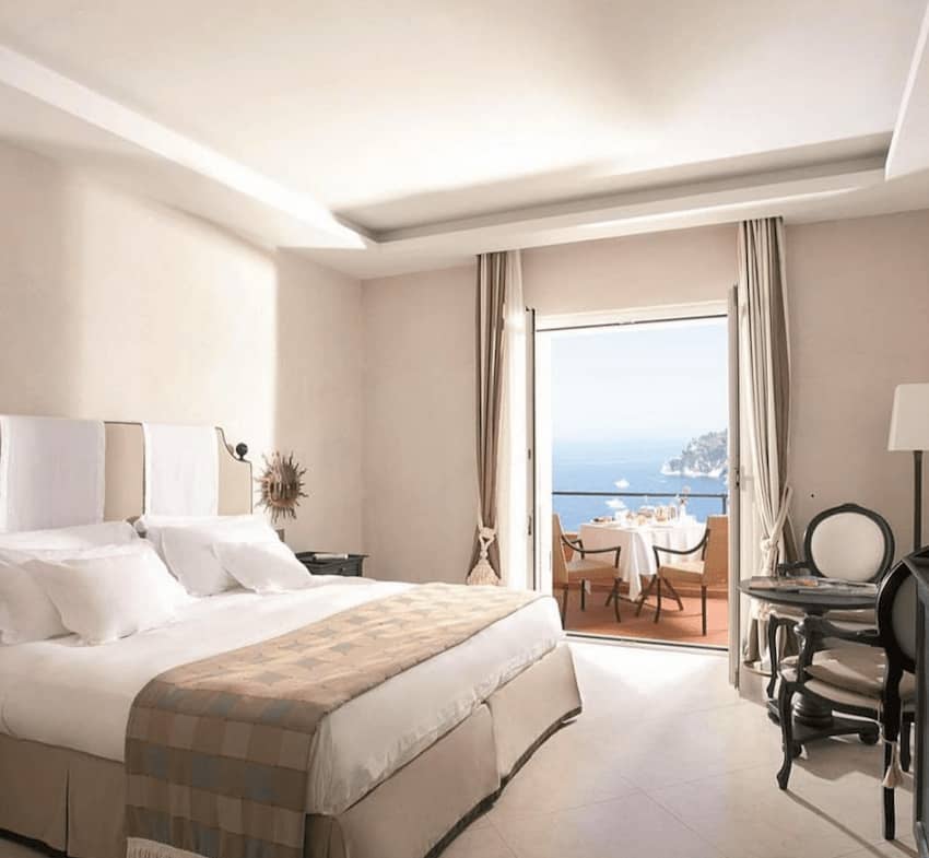 Punta Tragara Hotel luxurious queen size bedroom terrace
