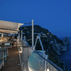lounge bar nightscene balcony sea view cliffside