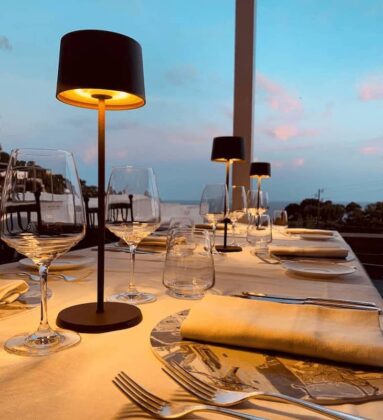 romantic elegant table setting lit lamp