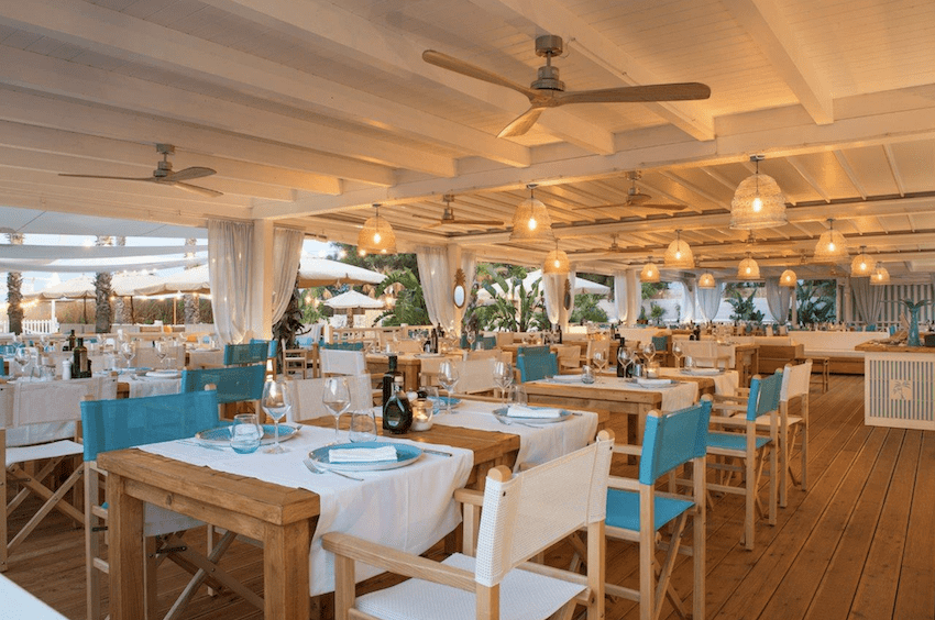 Le Palme Beach Club terrace chairs table