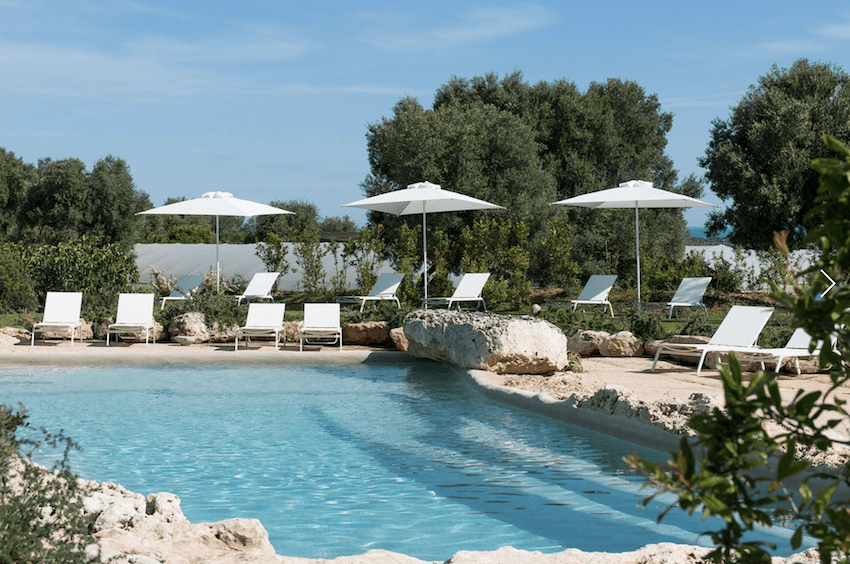Masseria San Francesco pool sunbeds threes