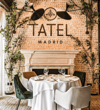 Tatel restaurant Madrid fireplace dining lamps