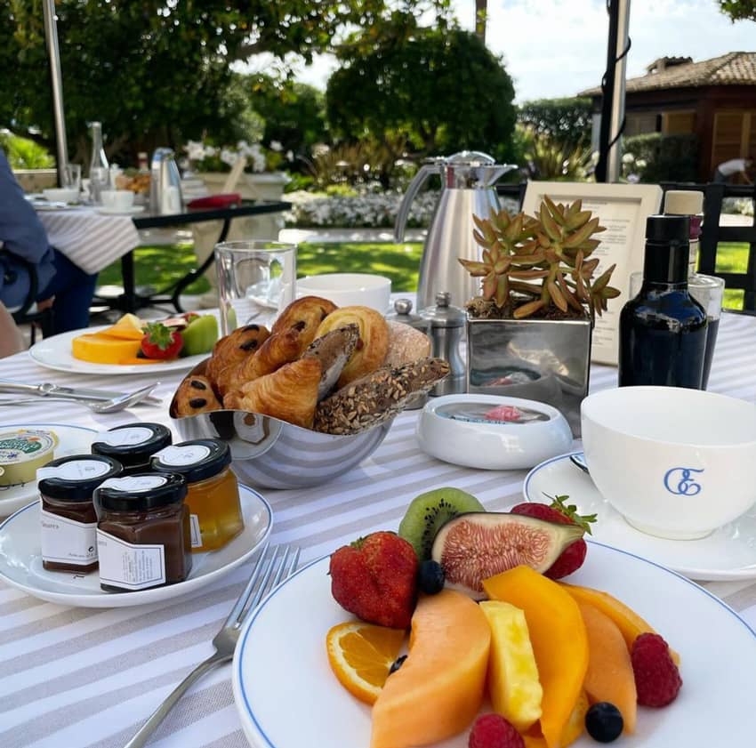 Breakfast on a terrace with fruits at Cap Estel