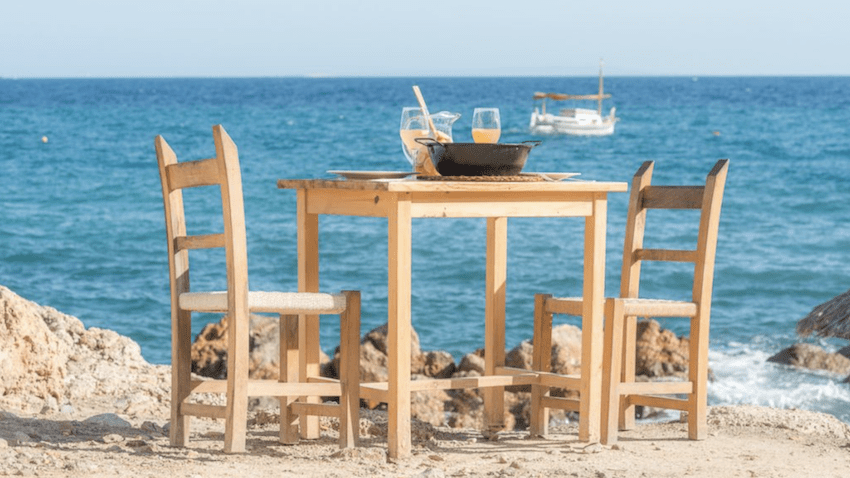 ses boques wooden chairs food with sea view